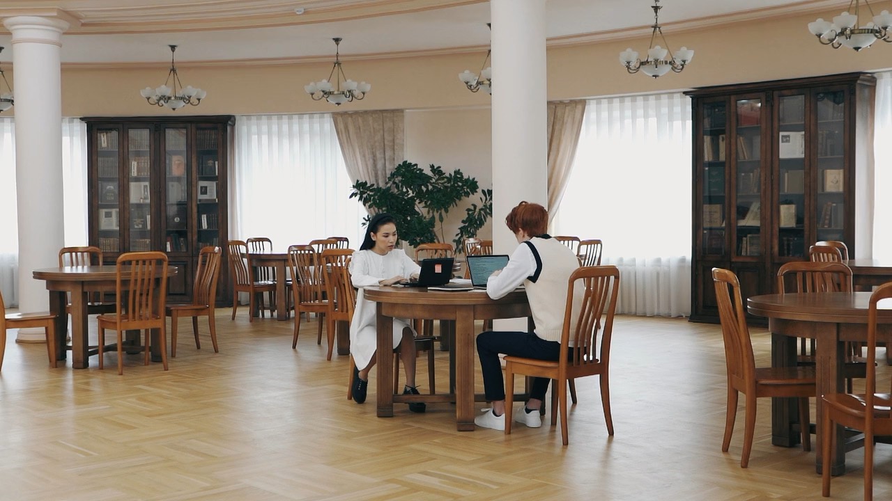 Students working together in a university library